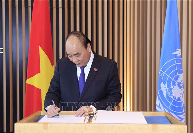Chủ tịch nước gặp Tổng Giám đốc Văn phòng LHQ tại Geneva Chú thích ảnh