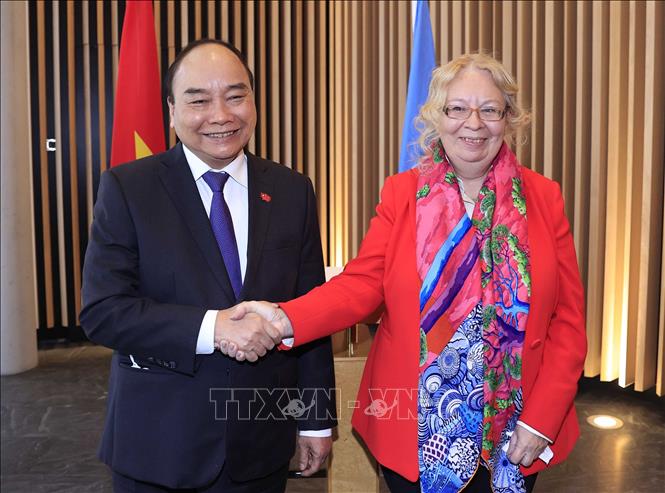 Chủ tịch nước gặp Tổng Giám đốc Văn phòng LHQ tại Geneva Chú thích ảnh