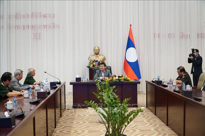 Lãnh đạo Lào đánh giá rất cao sự hy sinh to lớn của quân tình nguyện và chuyên gia Việt Nam Chú thích ảnh