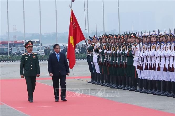 Thủ tướng: Chính sách quốc phòng của Việt Nam là vì hòa bình, tự vệ và vì nhân dân Chú thích ảnh