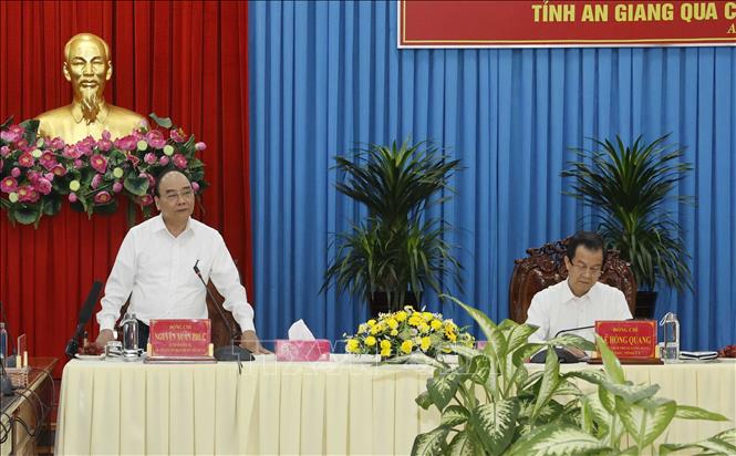 Chủ tịch nước gặp mặt, chúc Tết các đồng chí nguyên lãnh đạo tỉnh An Giang Chú thích ảnh