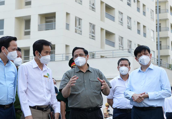 Thủ tướng Phạm Minh Chính kiểm tra tại Bệnh viện dã chiến số 3 - Ảnh: Tuổi Trẻ Thủ tướng Phạm Minh Chính kiểm tra tại Bệnh viện dã chiến số 3 - Ảnh: Tuổi Trẻ