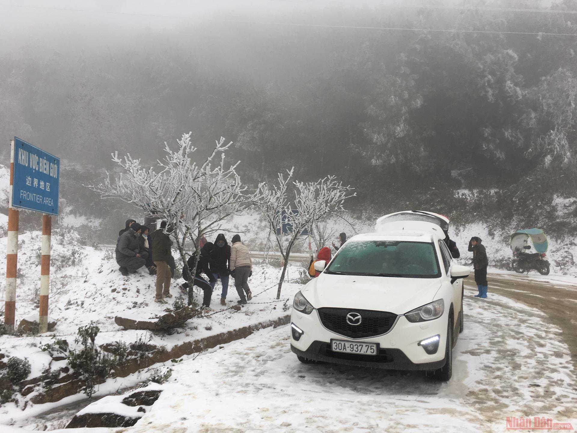 Northern Vietnam mountains engulfed in white snow Northern Vietnam mountains engulfed in white snow