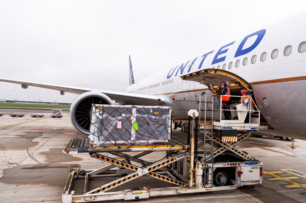 A shipment of Pfizer's coronavirus disease vaccines is unloaded from a United Airlines cargo-only flight from Brussels to O'Hare International Airport in Chicago, Illinois, US, on Dec 2, 2020. 1127 shipment