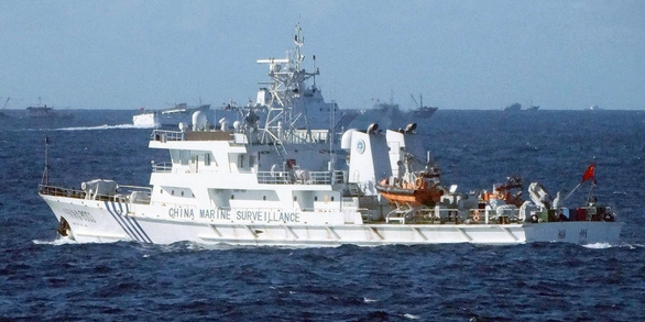 Một tàu Trung Quốc di chuyển gần quần đảo Senkaku/Điếu Ngư đang tranh chấp giữa Nhật Bản và Trung Quốc - Ảnh: KYODO Một tàu Trung Quốc di chuyển gần quần đảo Senkaku/Điếu Ngư đang tranh chấp giữa Nhật Bản và Trung Quốc - Ảnh: KYODO