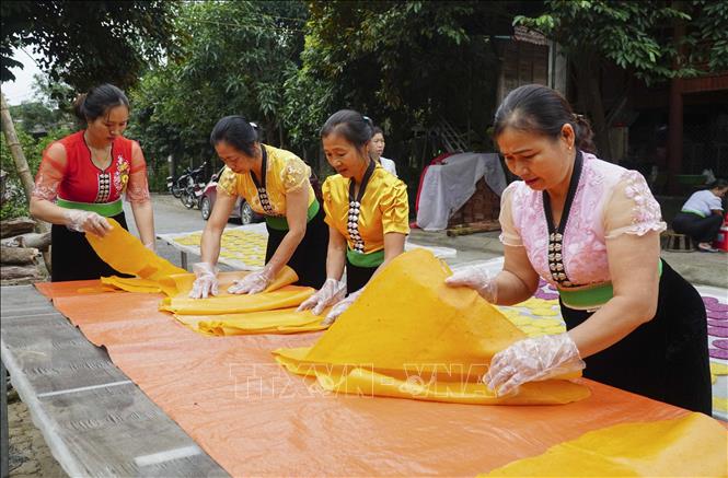 Độc đáo bánh khẩu xén của đồng bào Thái trắng - Điện Biên Chú thích ảnh
