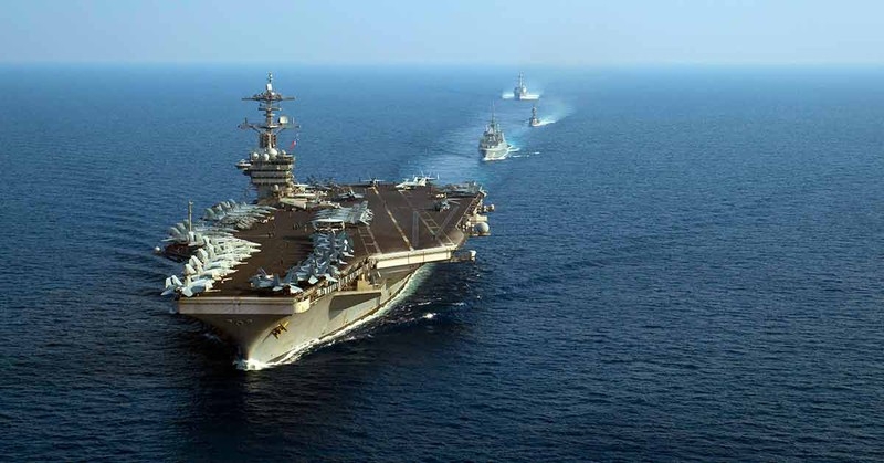 Tàu sân bay USS Theodore Roosevelt của Mỹ dẫn đầu đội tàu hải quân Mỹ và Singapore trong một lần hoạt động ở Biển Đông. Ảnh: AFP 2901 trung quoc