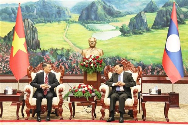 Van phong TW Dang Cong san Viet Nam va Dang NDCM Lao day manh hop tac hinh anh 2