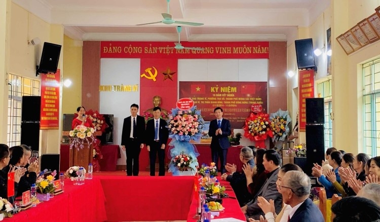 越南长尾区和中国万尾村的十年结义