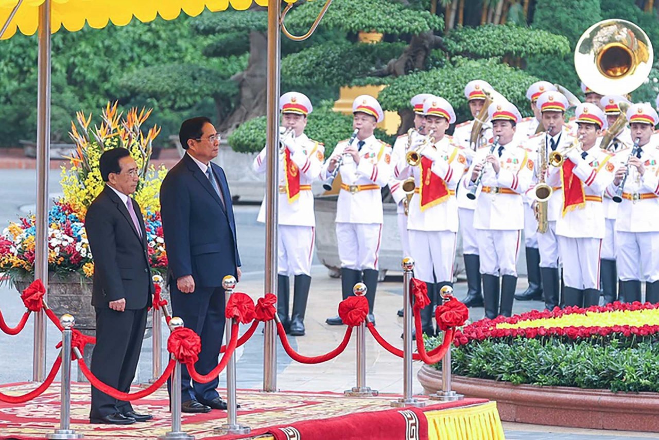 Thủ tướng Phạm Minh Chính chủ trì lễ đón Thủ tướng Chính phủ Lào Phankham Viphavanh thăm chính thức Việt Nam ngày 8/1/2022 tại Phủ Chủ tịch. (Nguồn: TTXVN) Thủ tướng Phạm Minh Chính chủ trì lễ đón Thủ tướng Chính phủ Lào Phankham Viphavanh thăm chính thức Việt Nam ngày 8/1/2022 tại Phủ Chủ tịch. (Nguồn: TTXVN)
