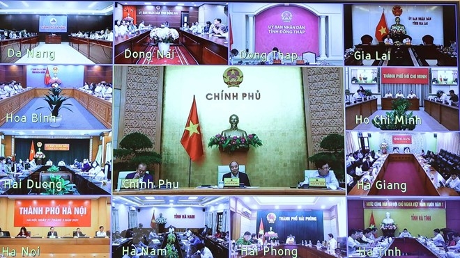 In photos: PM calls on Vietnam to keep on pursuing twin goals In photos: PM calls on Vietnam to keep on pursuing twin goals