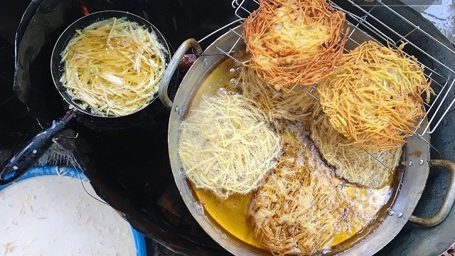 Fried sweet potato cake, delightful street food in Vietnam fried sweet potato cake delightful street food in vietnam
