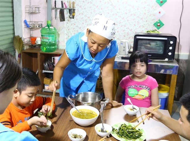 Japanese teacher bridges gap with Vietnamese children with autism japanese teacher bridges gap with vietnamese children with autism