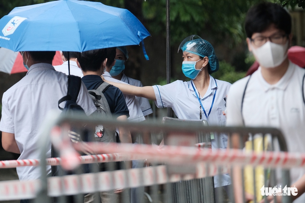 Torrential rain no problem for Hanoi test-takers Torrential rain no problem for Hanoi test takers