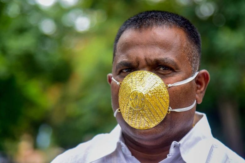 undefined Shankar Kurhade and his tailored-made gold face mask