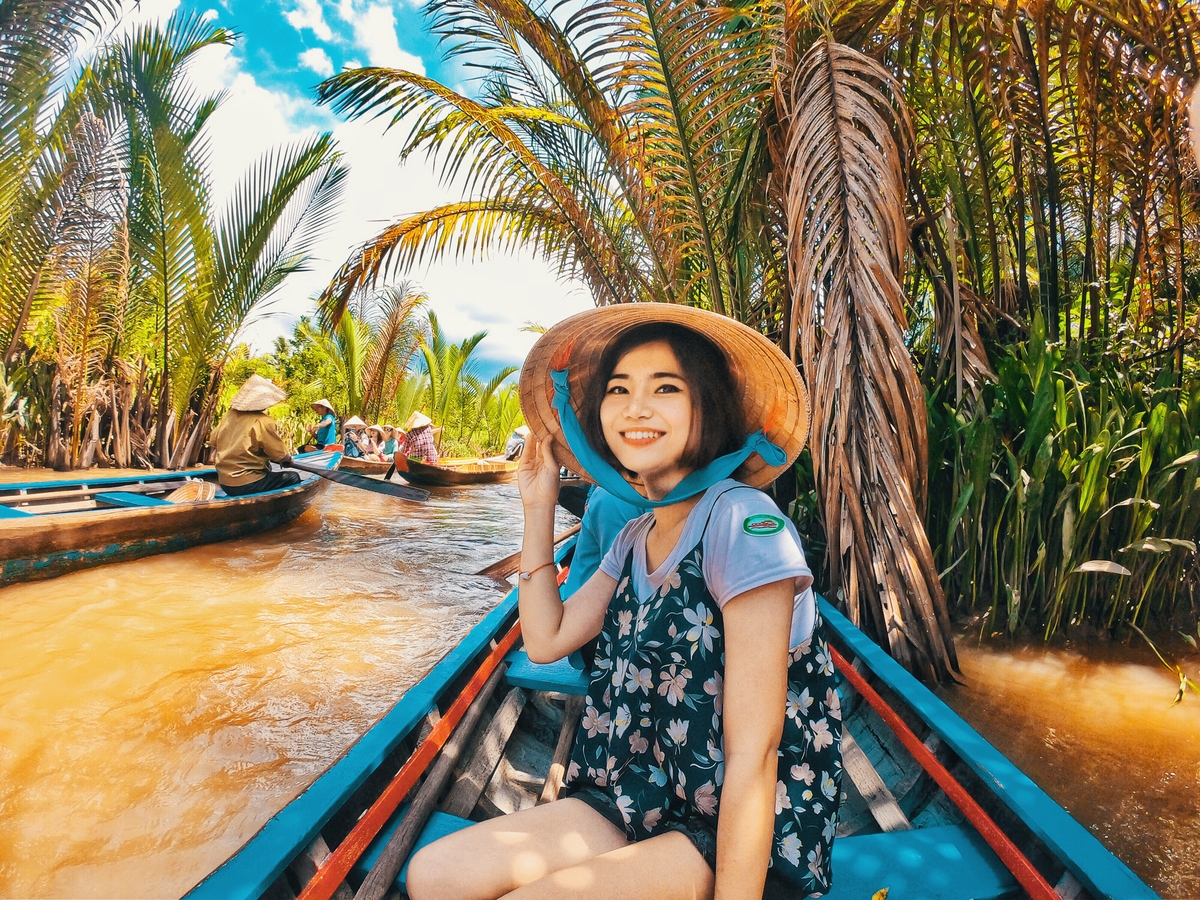 5 must-visit places in Southwest Vietnam Minh diep's wearing the iconic conical hat of vietnamese women
