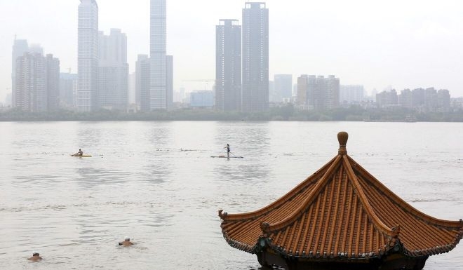 China flood latest News: Four cities declare top-level warnings, millions people affected A submerged riverside pavilion in wuhan