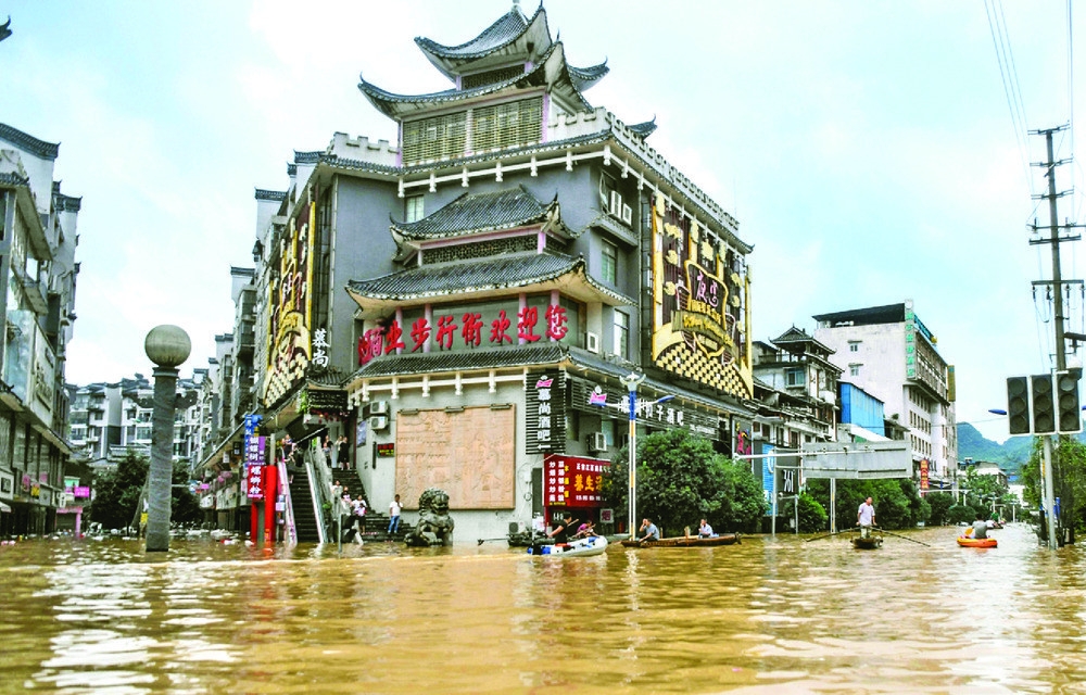 undefined The mainland's flood response alert was raised to the second-highest level yesterday
