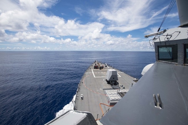 US Navy destroyer sails near the Truong Sa (Spratly) Islands he uss ralph johnson sailing near the spratly islands