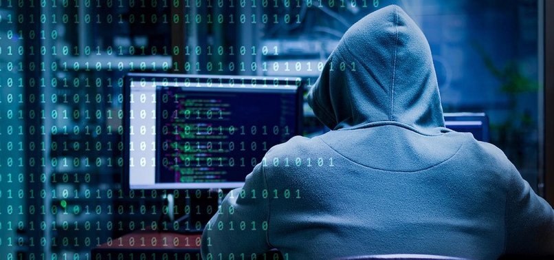 The Justice Department on Tuesday publicly accused two Chinese hackers of stealing trade secrets from companies across the world 