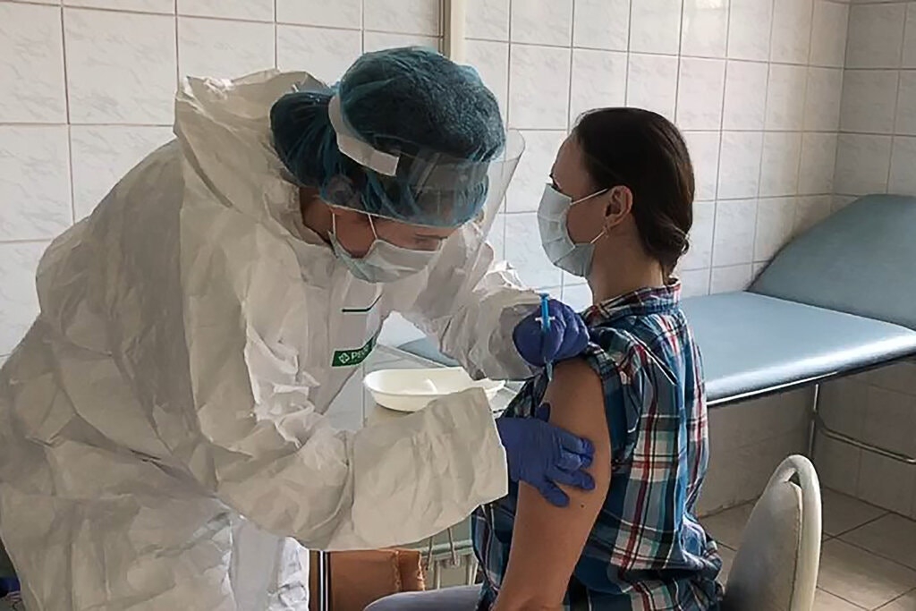 undefined A volunteer receives the vaccine developed by the Gamaleya Institute as part of clinical trials