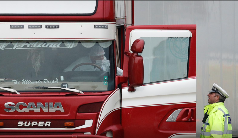 undefined Police move the lorry container where bodies were discovered, in Grays, Essex, Britain October 23, 2019.