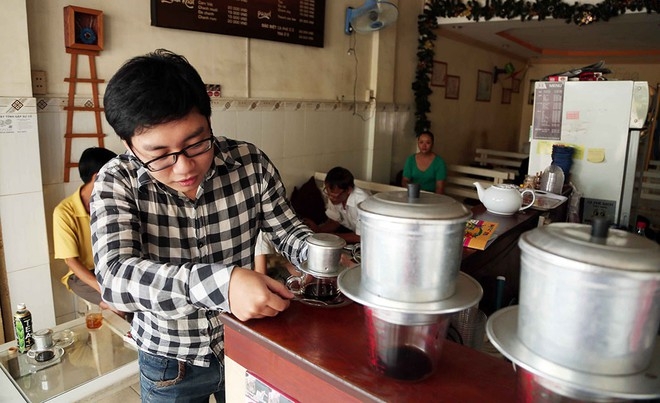 undefined Coffee in Hanoi is brewed in a traditional filter,