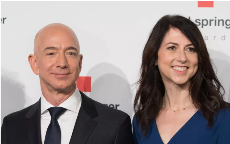Amazon billionaire MacKenzie Scott donates billions of USD to 384 organizations MacKenzie bezos with then-husband jeff in berlin april 2018 (photo: vox)