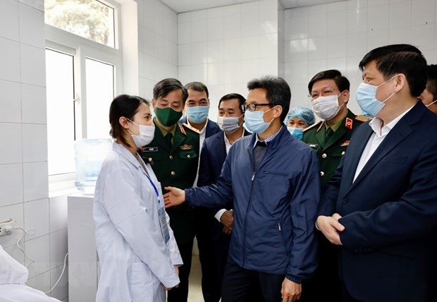 Deputy PM visits Vietnam’s first COVID-19 vaccine volunteers Deputy prime minister vũ Đức Đam visits the volunteers on december 20 (photo: vna)
