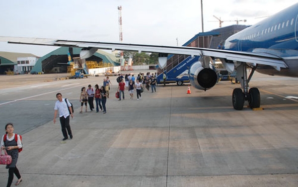 undefined Passengers arrive at Tan Son Nhat international airport (Photo: Nguoi Lao Dong)