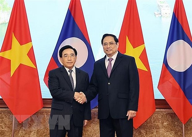 Kết nối hai nền kinh tế Việt Nam-Lào về cả thể chế và hạ tầng | Kinh tế | Vietnam+ (VietnamPlus) Kết nối hai nền kinh tế Việt Nam-Lào về cả thể chế và hạ tầng | Kinh tế | Vietnam+ (VietnamPlus)