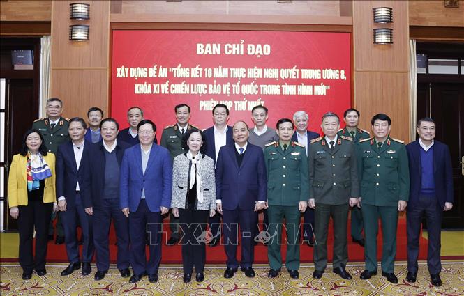Chủ tịch nước Nguyễn Xuân Phúc chủ trì Phiên họp thứ nhất BCĐ xây dựng Đề án Tổng kết Chiến lược bảo vệ Tổ quốc trong tình hình mới Chú thích ảnh