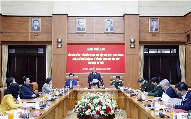 Chủ tịch nước Nguyễn Xuân Phúc chủ trì Phiên họp thứ nhất BCĐ xây dựng Đề án Tổng kết Chiến lược bảo vệ Tổ quốc trong tình hình mới Chú thích ảnh