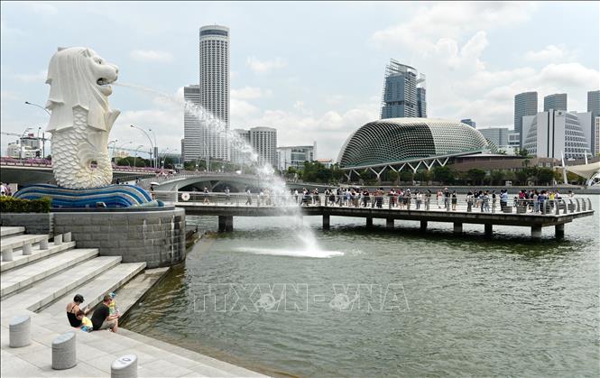 Chuyên gia Singapore: chuyến thăm của Chủ tịch nước Nguyễn Xuân Phúc tái khẳng định quan hệ hợp tác chặt chẽ song phương Chú thích ảnh