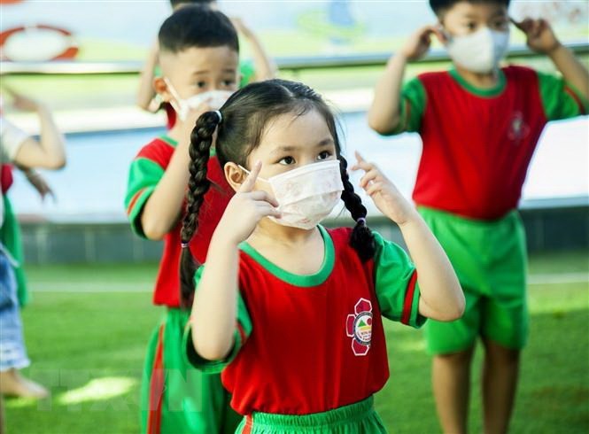 Từ 13/4: Trẻ mầm non ở Hà Nội quay trở lại trường học trực tiếp. (Ảnh: Hồng Đạt/TTXVN) Từ 13/4: Trẻ mầm non ở Hà Nội quay trở lại trường học trực tiếp. (Ảnh: Hồng Đạt/TTXVN)
