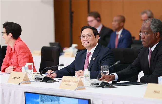 Thủ tướng nêu thông điệp tại phiên họp của Hội nghị thượng đỉnh G7 mở rộng Chú thích ảnh