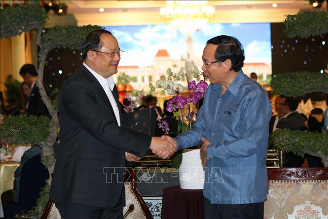 TP Hồ Chí Minh: Nâng cao hiệu quả hợp tác kinh tế tương xứng với mối quan hệ Việt Nam - Lào Chú thích ảnh