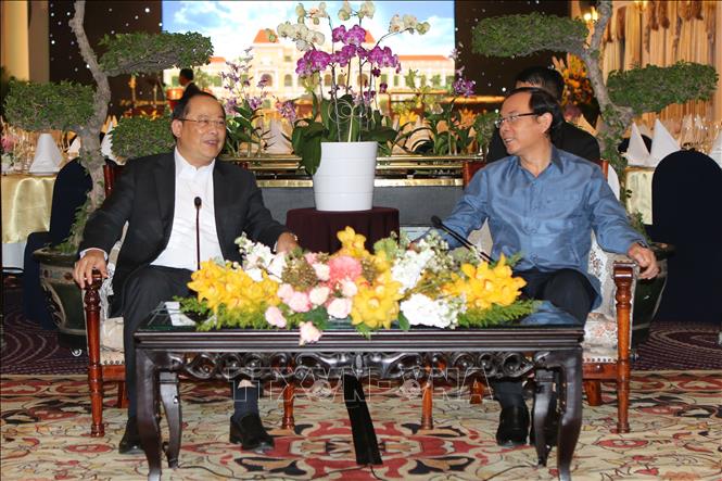 TP Hồ Chí Minh: Nâng cao hiệu quả hợp tác kinh tế tương xứng với mối quan hệ Việt Nam - Lào Chú thích ảnh