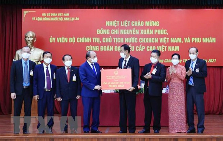 Chủ tịch nước đánh giá cao cộng đồng người Việt tại Lào luôn hướng về đất nước
