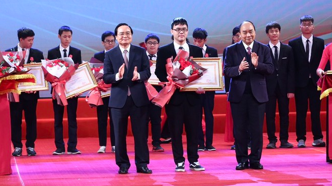 students winning international olympic awarded labor medals