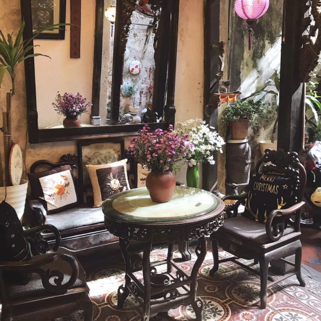 tranquil coffee shop placed in hanois 102 year old house