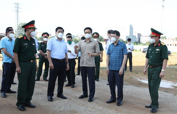 PM urges controlling pandemic outbreaks in Bac Ninh, Bac Giang provinces PM urges controlling pandemic outbreaks in Bac Ninh, Bac Giang provinces