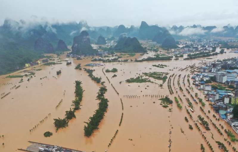 china flood updates thousands trapped after levees fail dams at risk of breaking