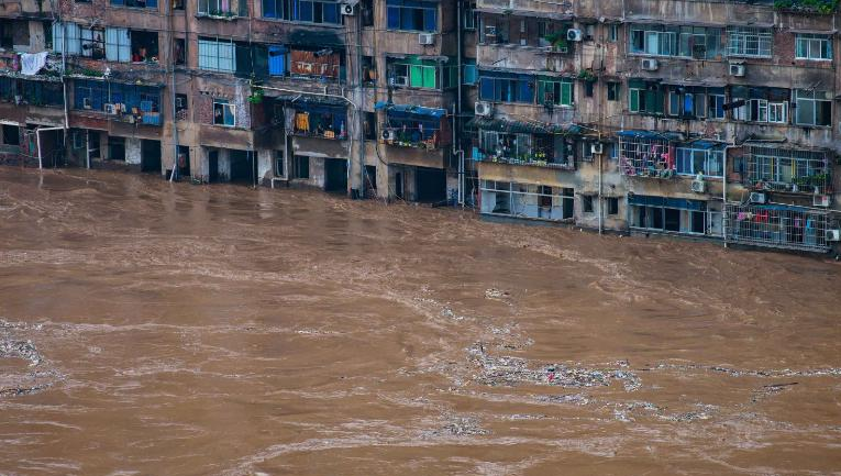china flood updates thousands trapped after levees fail dams at risk of breaking
