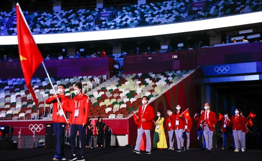 In Photo: Vietnamese Delegation Marches At Tokyo Olympics Opening Ceremony In Photo: Vietnamese Delegation Marches At Tokyo Olympics Opening Ceremony