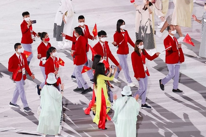 In Photo: Vietnamese Delegation Marches At Tokyo Olympics Opening Ceremony In Photo: Vietnamese Delegation Marches At Tokyo Olympics Opening Ceremony