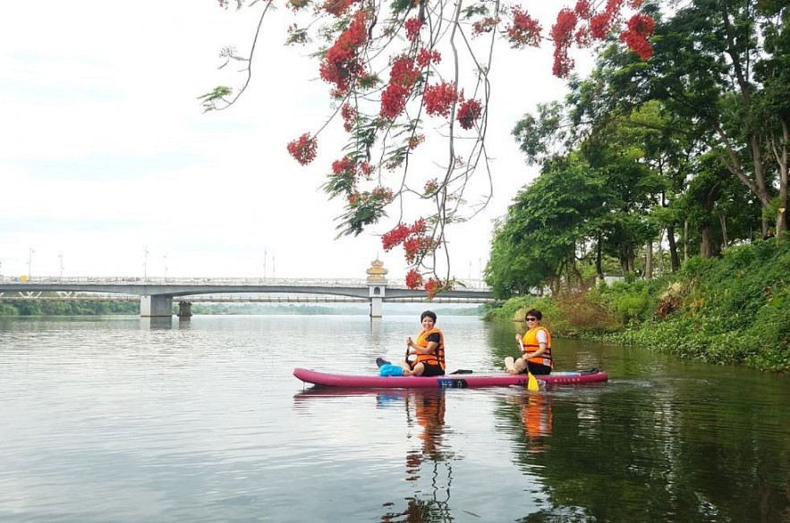 SUP Surfing on Huong River: Admiring Hue from New Angles SUP Surfing on Huong River: Admiring Hue from New Angles