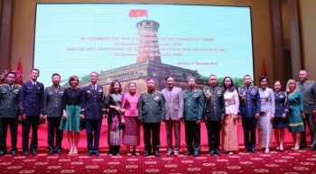 ຈັດຕັ້ງພິທີສະເຫຼີມສະຫຼອງ 75 ປີແຫ່ງວັນສ້າງຕັ້ງກອງທັບປະຊາຊົນຫວຽດນາມຢູ່ລາວ