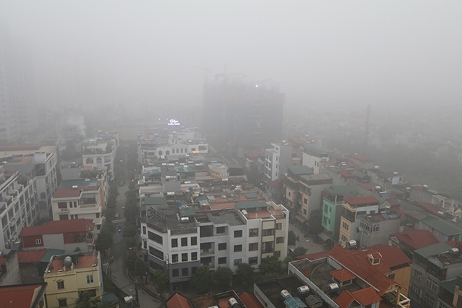 Sắp đón không khí lạnh, Hà Nội lại chìm trong sương mù trắng xóa sap don khong khi lanh ha noi lai chim trong suong mu trang xoa