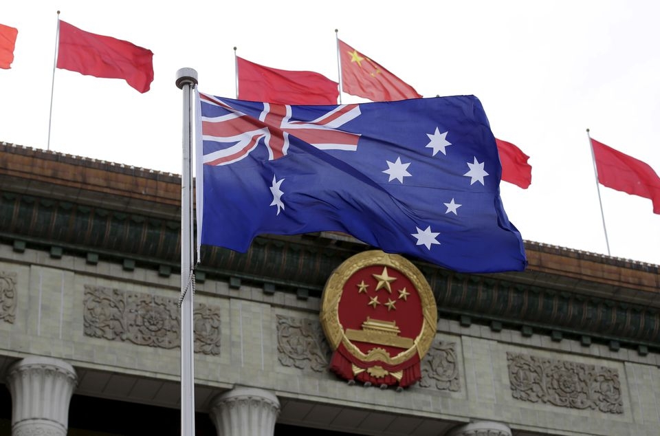 Australian flag flutters in front of the Great Hall of the People during a welcoming ceremony for Australian Prime Minister Malcolm Turnbull (not in picture) in Beijing, China, April 14, 2016. REUTERS/Jason Lee Australian flag flutters in front of the Great Hall of the People during a welcoming ceremony for Australian Prime Minister Malcolm Turnbull (not in picture) in Beijing, China, April 14, 2016. REUTERS/Jason Lee